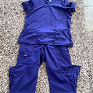 Cherokee purple scrubs top is large, bottoms are medium